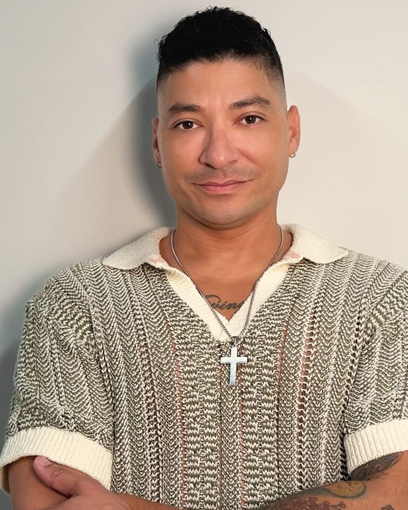 Jerry Nieves, smiling